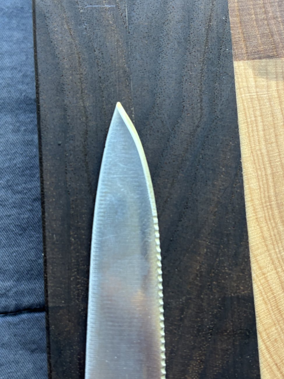 The same knife with the tip rebuilt to a clean point